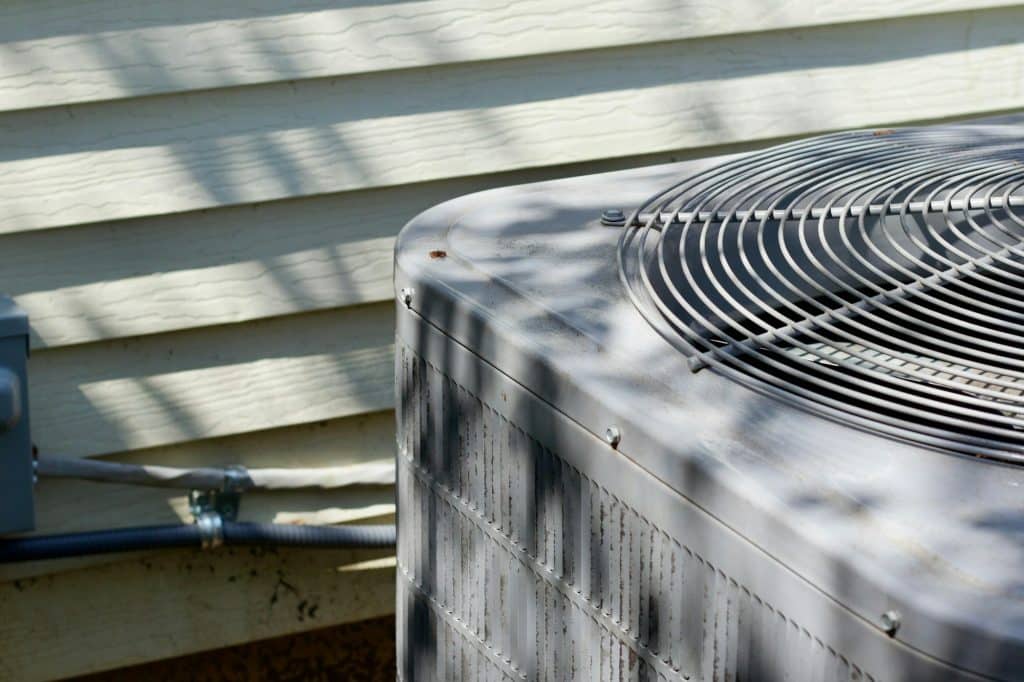 Trusted answers to heating and cooling questions in King & pierce counties |HVAC and pipe heading into house